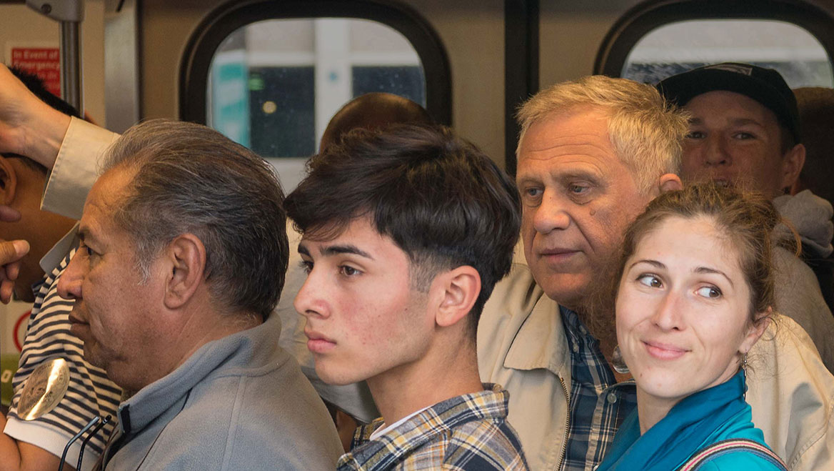 Transit issues like out-of-reach subway bars and safety concerns can prevent women from “[claiming] space in a man-made world.”  Photo courtesy of Understanding How Women Travel.