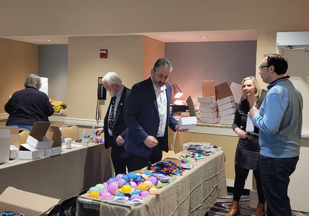 Participants in the Planners' Day of Service assemble Calming Kits to donate to Kamp for Kids. Credit: APA Women & Planning Division.