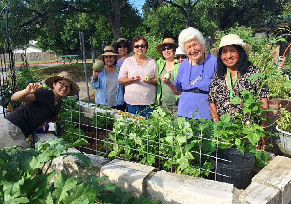 Residents work in one of Austin, Texas&rsquo; community gardens.