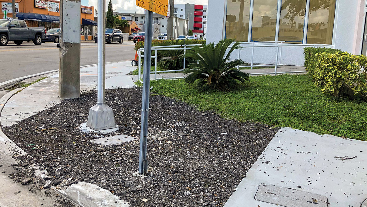 Create temporary curb ramps during construction projects (something that was not done in the above photo) to avoid limiting mobility options. Photo courtesy of Steve Wright.