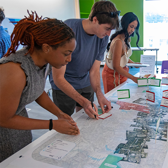 Red and green flags at a public library event attracted teen participants in an activity related to redevelopment, infrastructure, and placemaking. Photo courtesy of Gwinnett County.