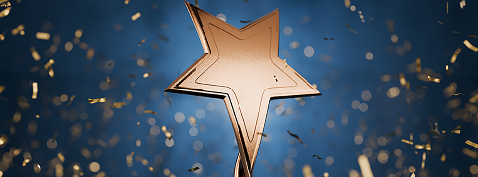 Bronze star trophy with falling confetti, symbolizing achievement.