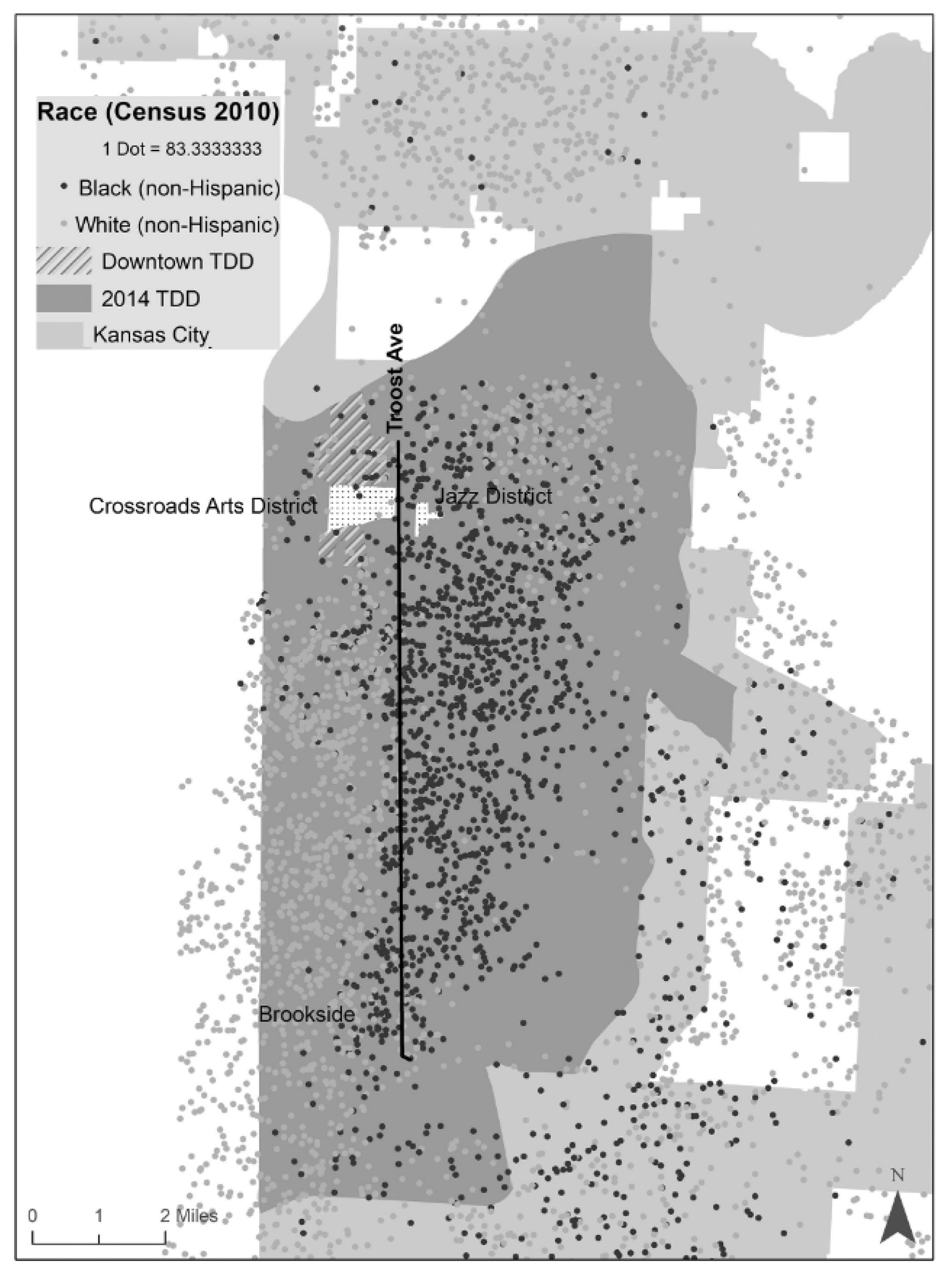A map illustrates how Troost Avenue bisects the city and forms a dividing line between areas with different demographic structures.