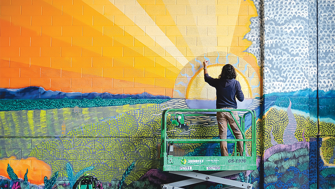 Andrea Limauro, an artist who also is a resilience planner for the D.C. Department of Energy and the Environment, created 'Endless Summer' as one in a four-part 'Climate of Future Past' series. Photo by Albert Ting.