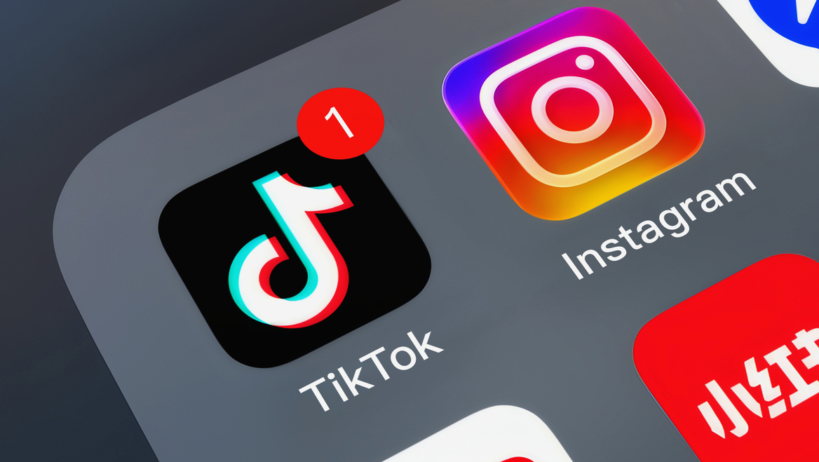 A zoomed in image of the TikTok app on a smartphone.