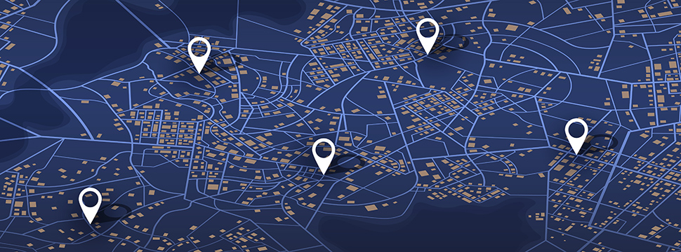A futuristic digital map with multiple navigation pins.