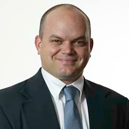 A headshot of Nathan Slaughter