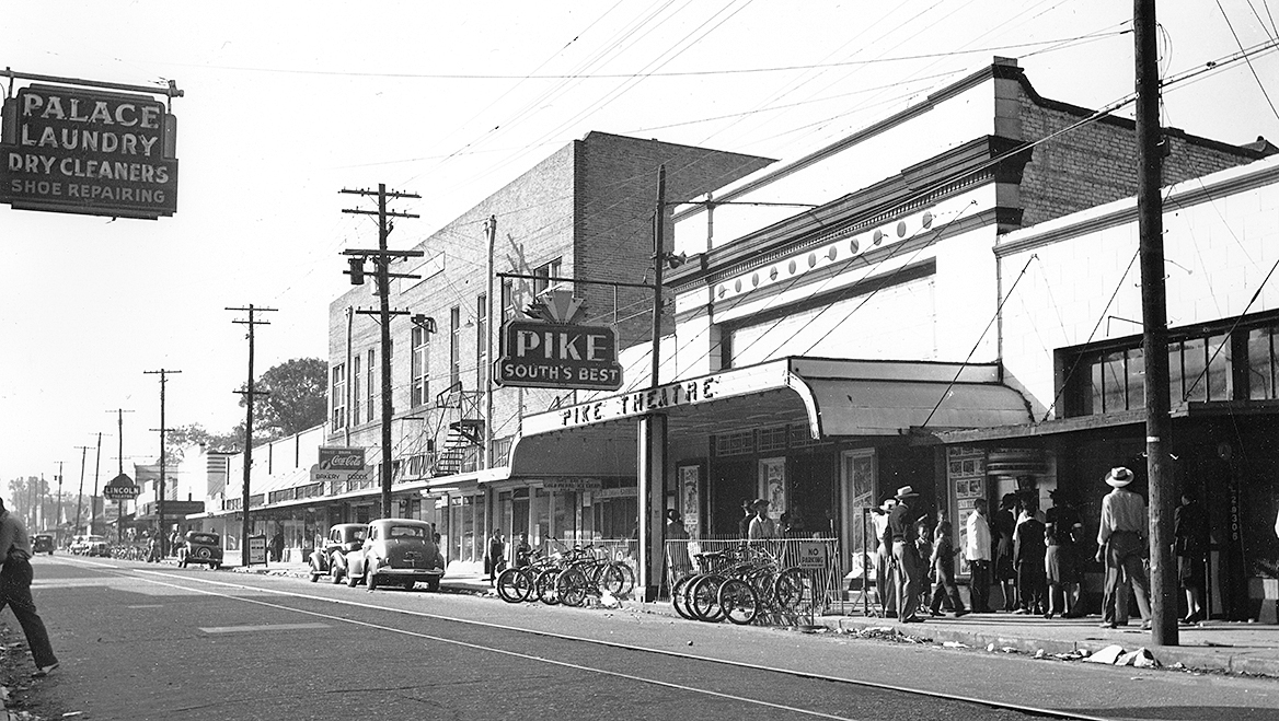 atrons line up outside the Pike Theater on Davis Avenue in this vintage photo from Mobile, Alabama. The street marked the epicenter of Black culture and business. Photo courtesy of Julius E. Marx Collection, The Doy Leale McCall Rare Book and Manuscript Library, University of South Alabama.