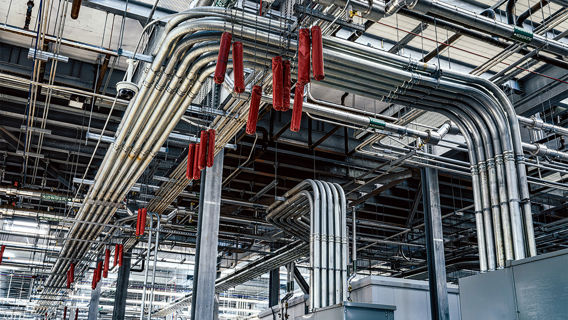 Hundreds of pipes snake through the mechanical yard of a data center in Ashburn, Virginia.
