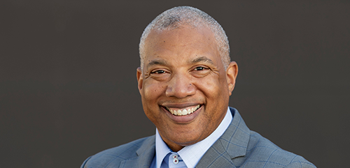 NPC26 Speaker John Register