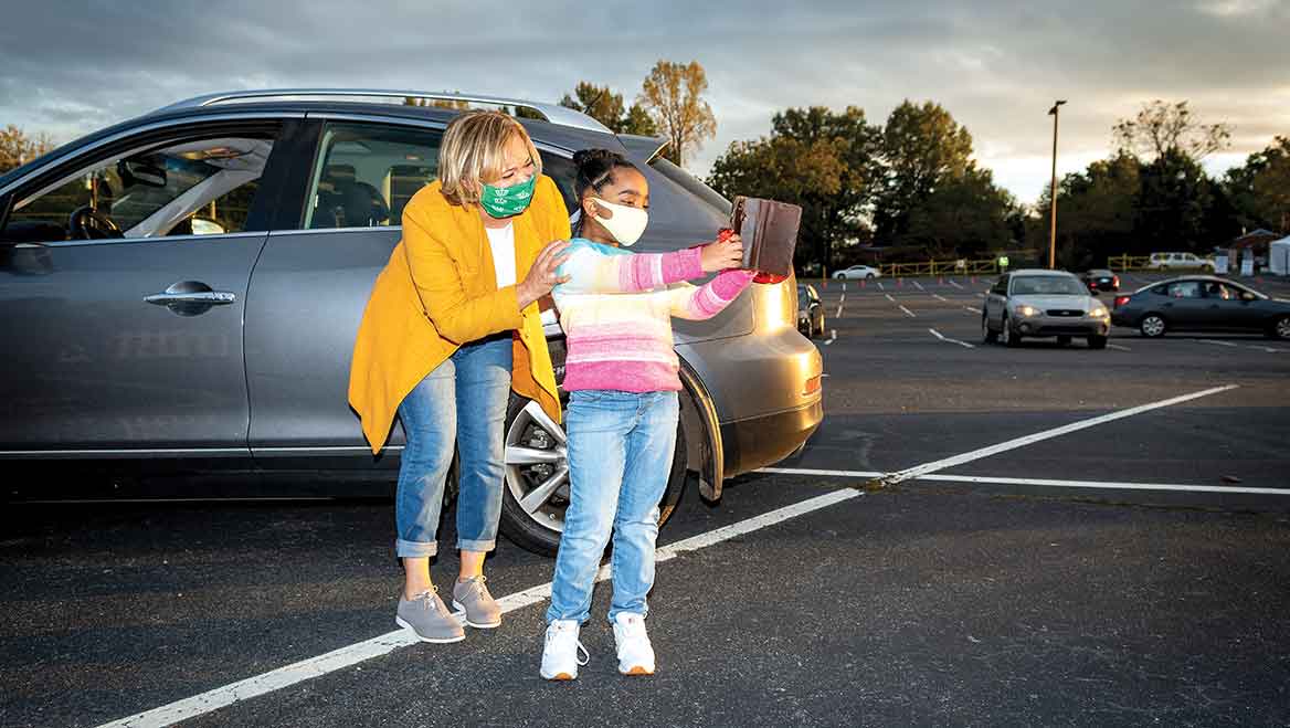 Staff and youth engagement at a drive-through event. Photo by Glyn A Stanley Photography.