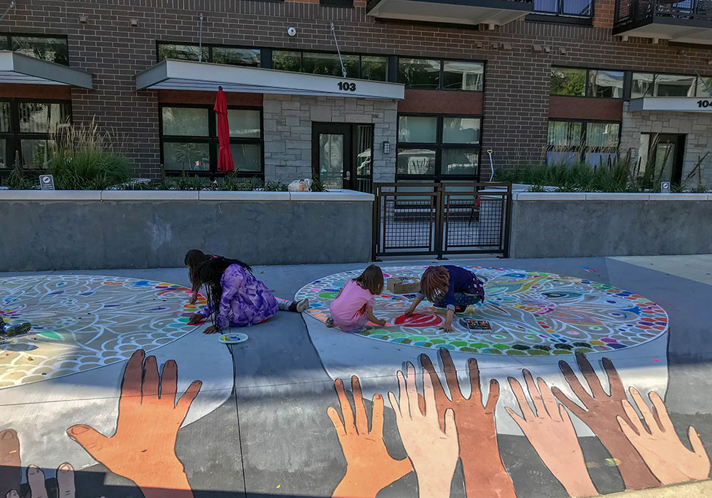 Coloring a mandala by artist Shawn McCann at the Artery grand opening. Photo courtesy Bolton & Menk.