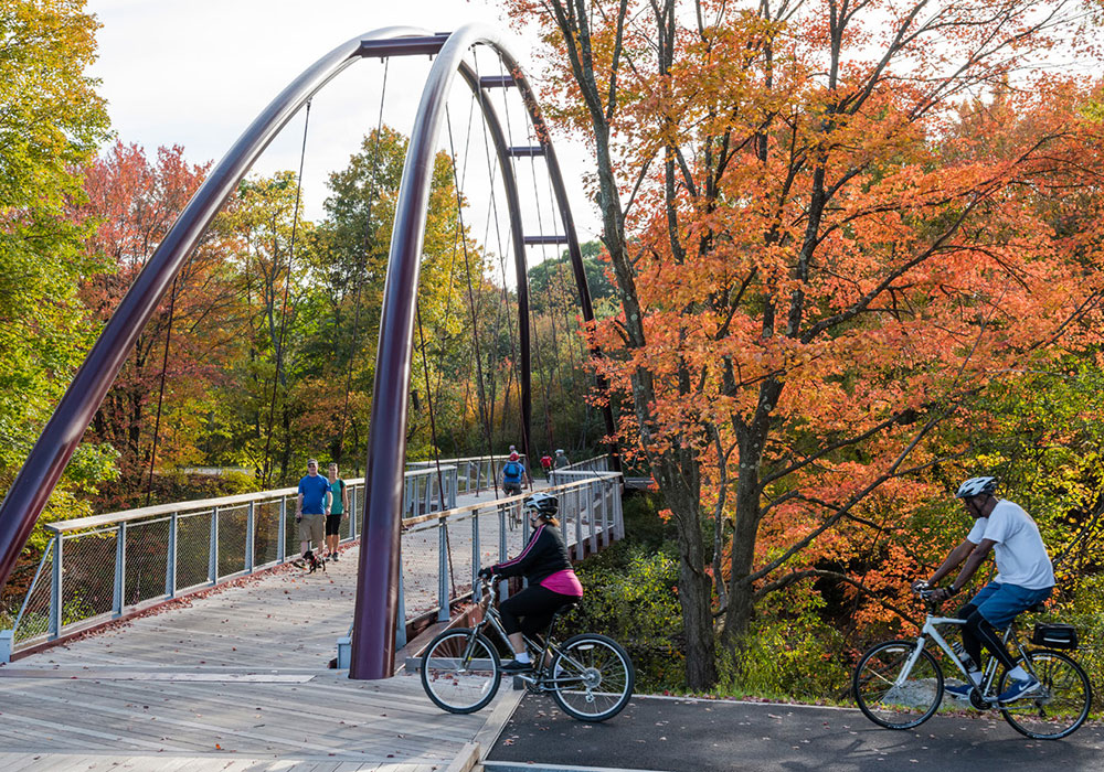 Cyclists and pedestrians use the Harvest River Bridge. Photo by Anton Grassl.