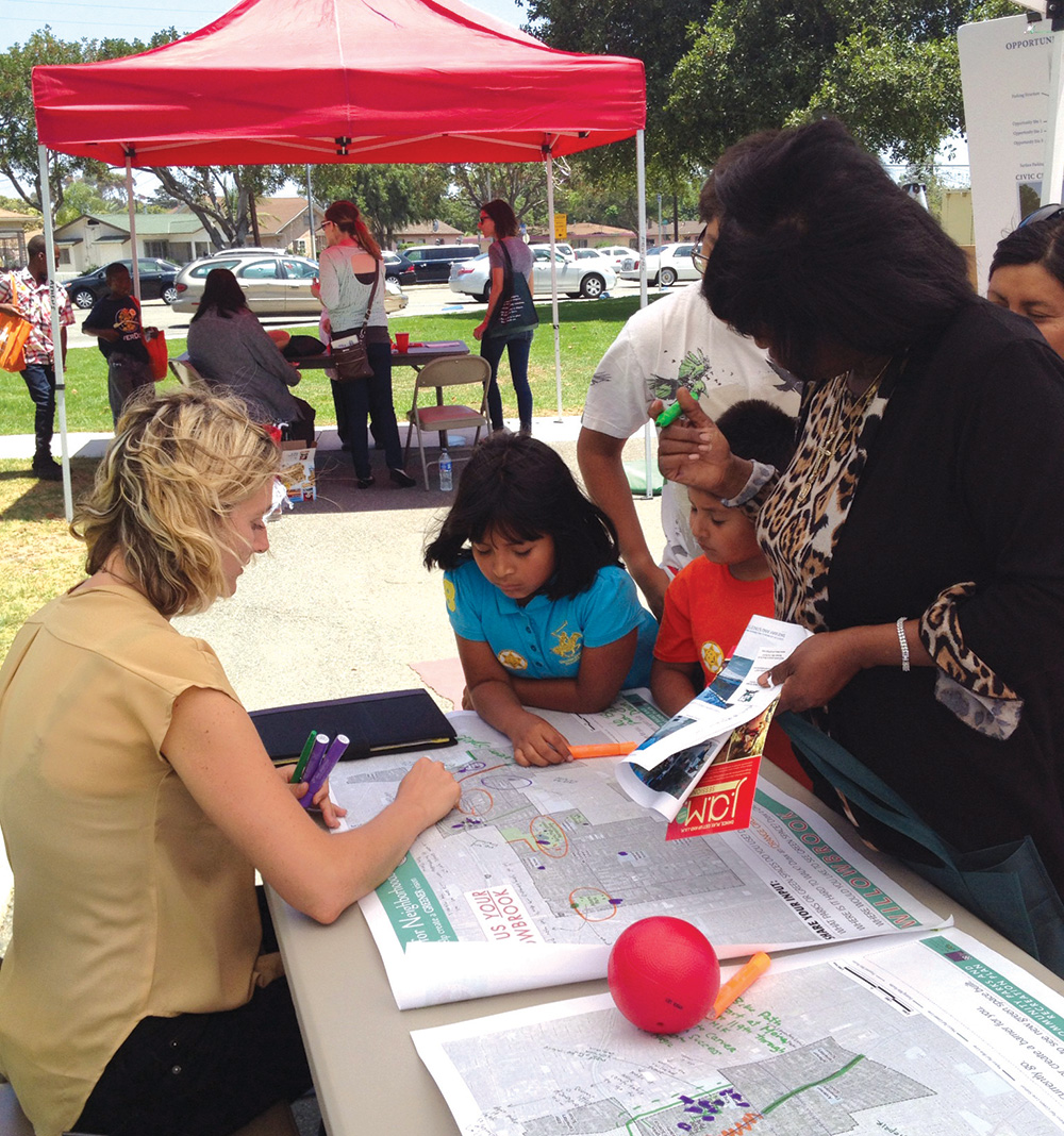 Community members in Willowbrook participate in an outreach fair