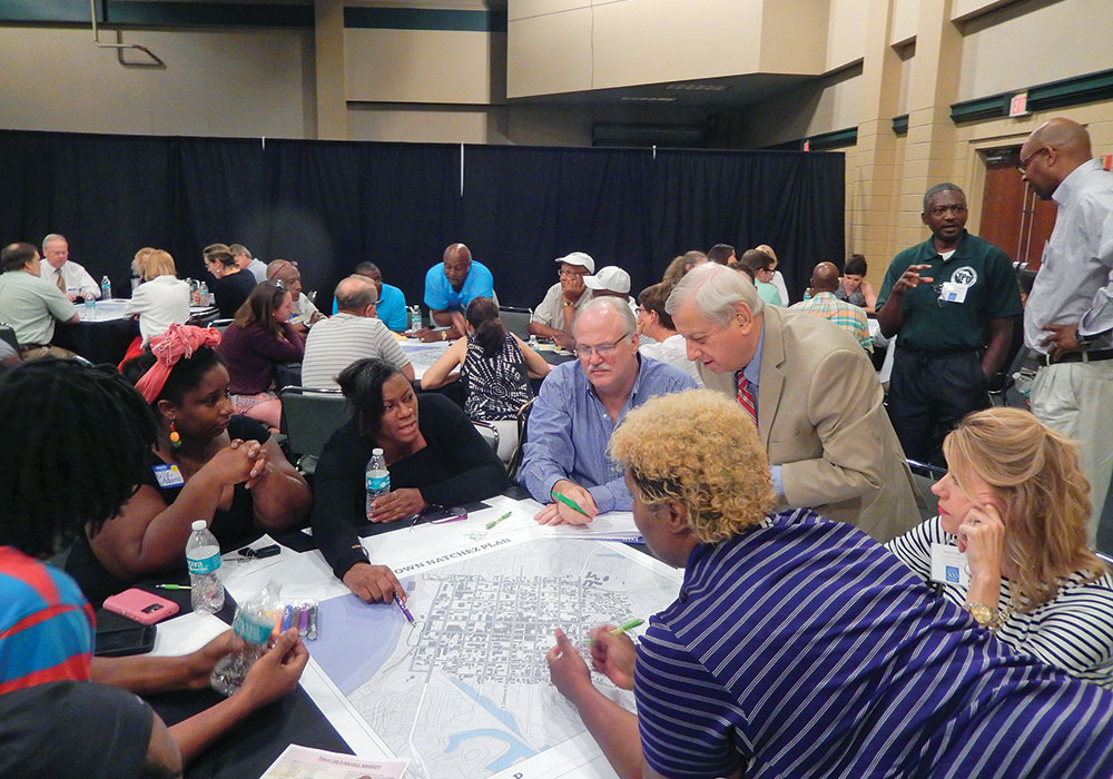 Residents discuss options at a community workshop