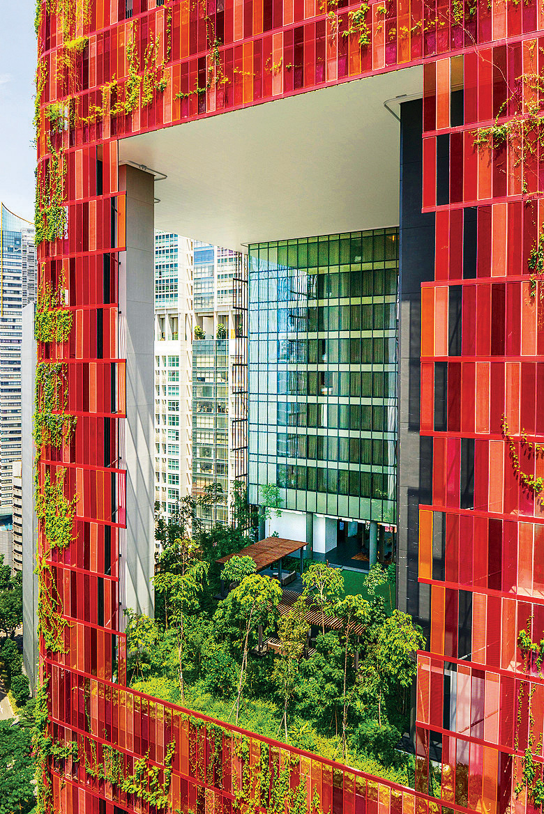 Singapore’s Oasia Hotel has reduced its air-conditioned area by 25 percent by opening areas like reception to the outdoors. Photos by K. Kopter.