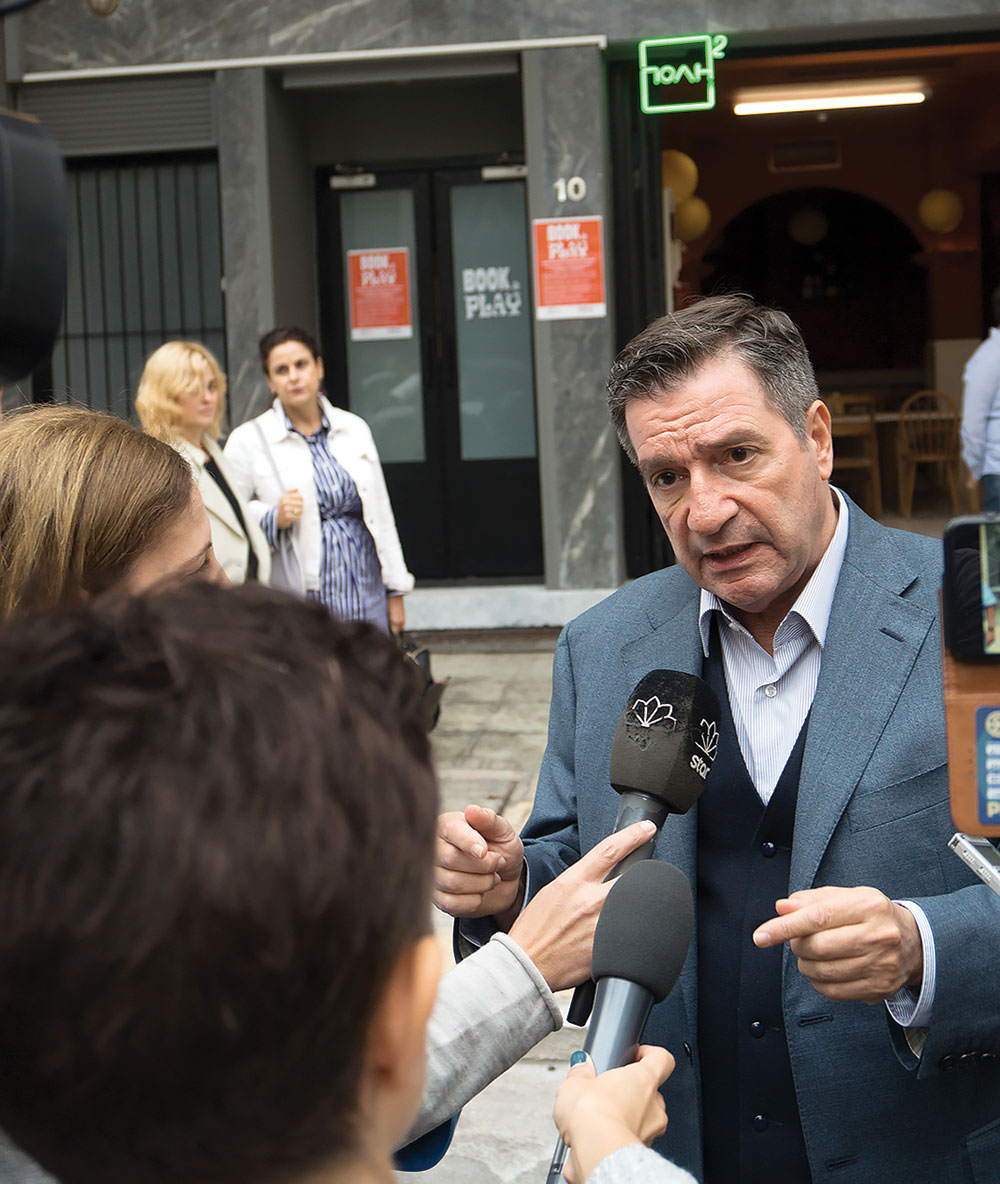 Mayor Giorgos Kamini speaks to reporters during the program’s official launch. Photo by Michael Kavalar.