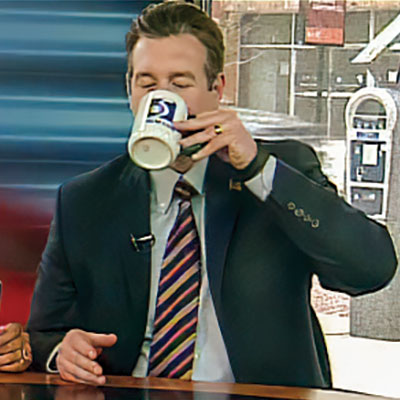 Then-Mayor Dayne Walling drinks Flint water on TV to prove it’s safe.