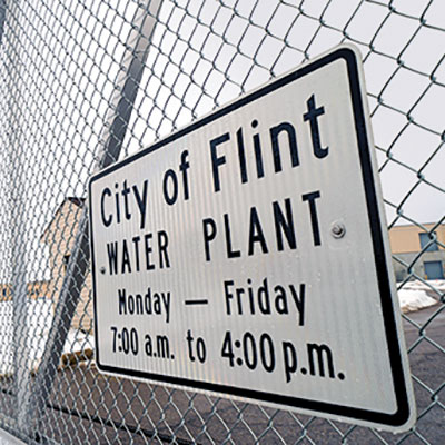 Residents file a federal class action lawsuit claiming state and city officials knowingly exposed them to toxic water.