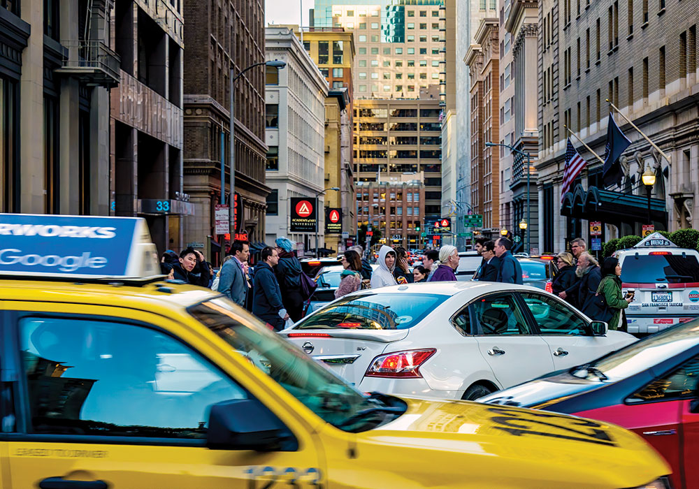 Busy Market Street in San Francisco will soon be off limits to personal cars. A two-mile stretch will get transit-only lanes, bikeways, and painted safety zones. Photo by Sergio Ruiz.