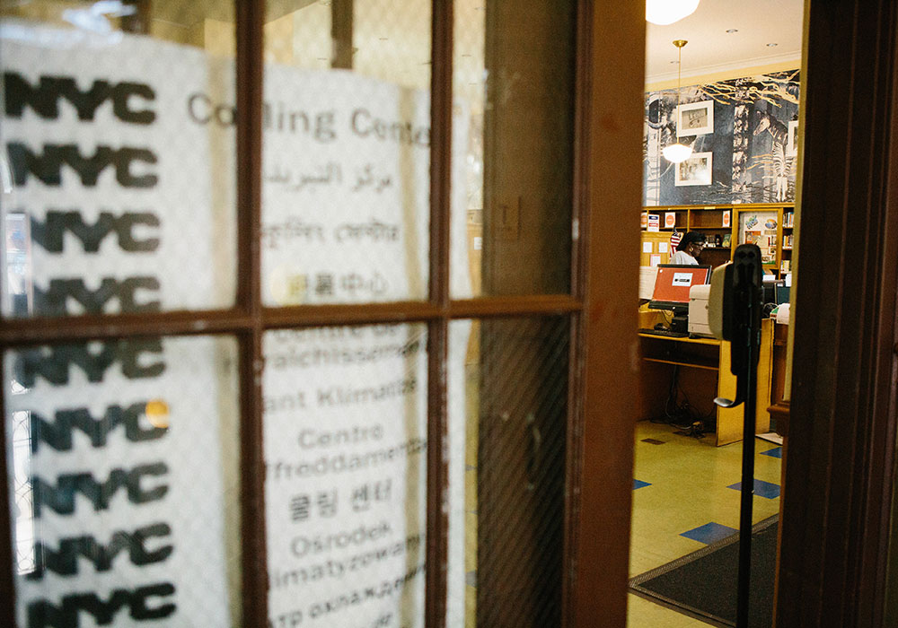 A cooling center in a New York Public Library during a 2019 heatwave in the eastern U.S. Photo by Gabriela Bhaskar/The New York Times.