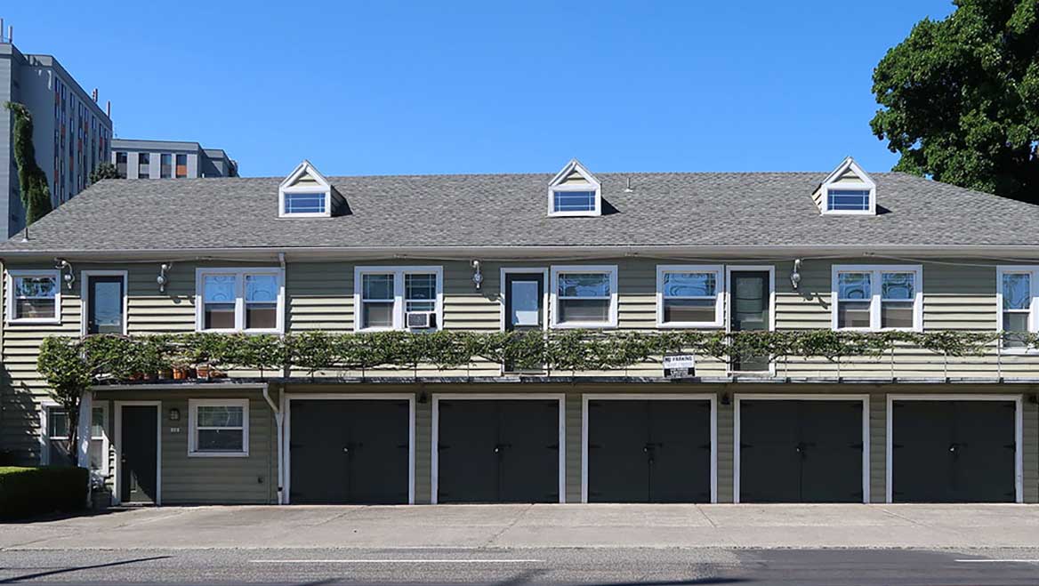 Requiring parking for each residence can make construction of multifamily buildings more expensive and, in some cases, impossible due to lot size or terrain constraints. Photo courtesy Mark McClure/Sightline Institute Middle Homes Photo Library.