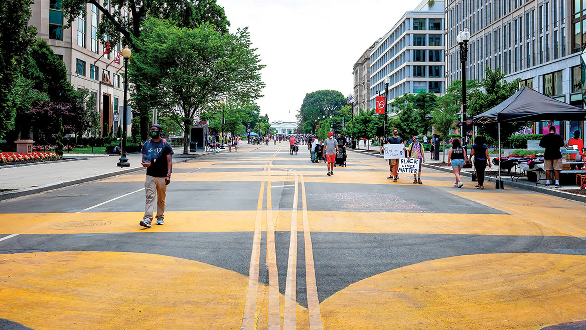 In Washington, D.C., a street mural at 16th Street and Lafayette Park designates the pedestrians-only Black Lives Matter Plaza. Photo by Allison C. Bailey/Shutterstock.