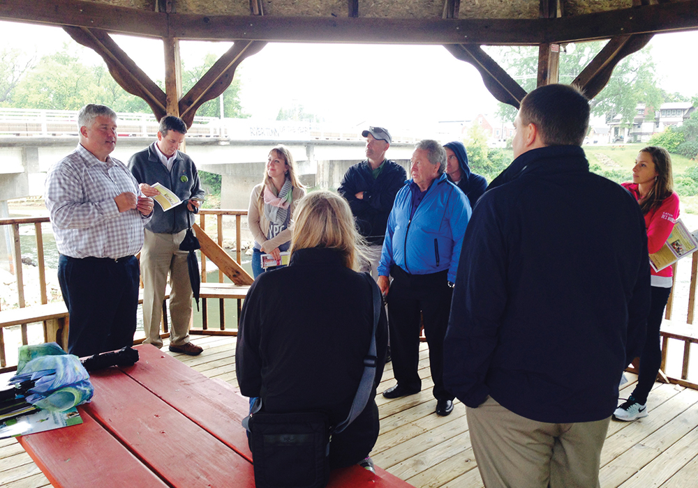 Rick Tollakson leads a group from the Greater Des Moines region