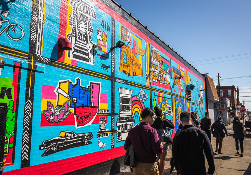 API members got an up close look at a mural designed by elementary students at Francis Scott Key School. Photo credit: Tobin Stuff