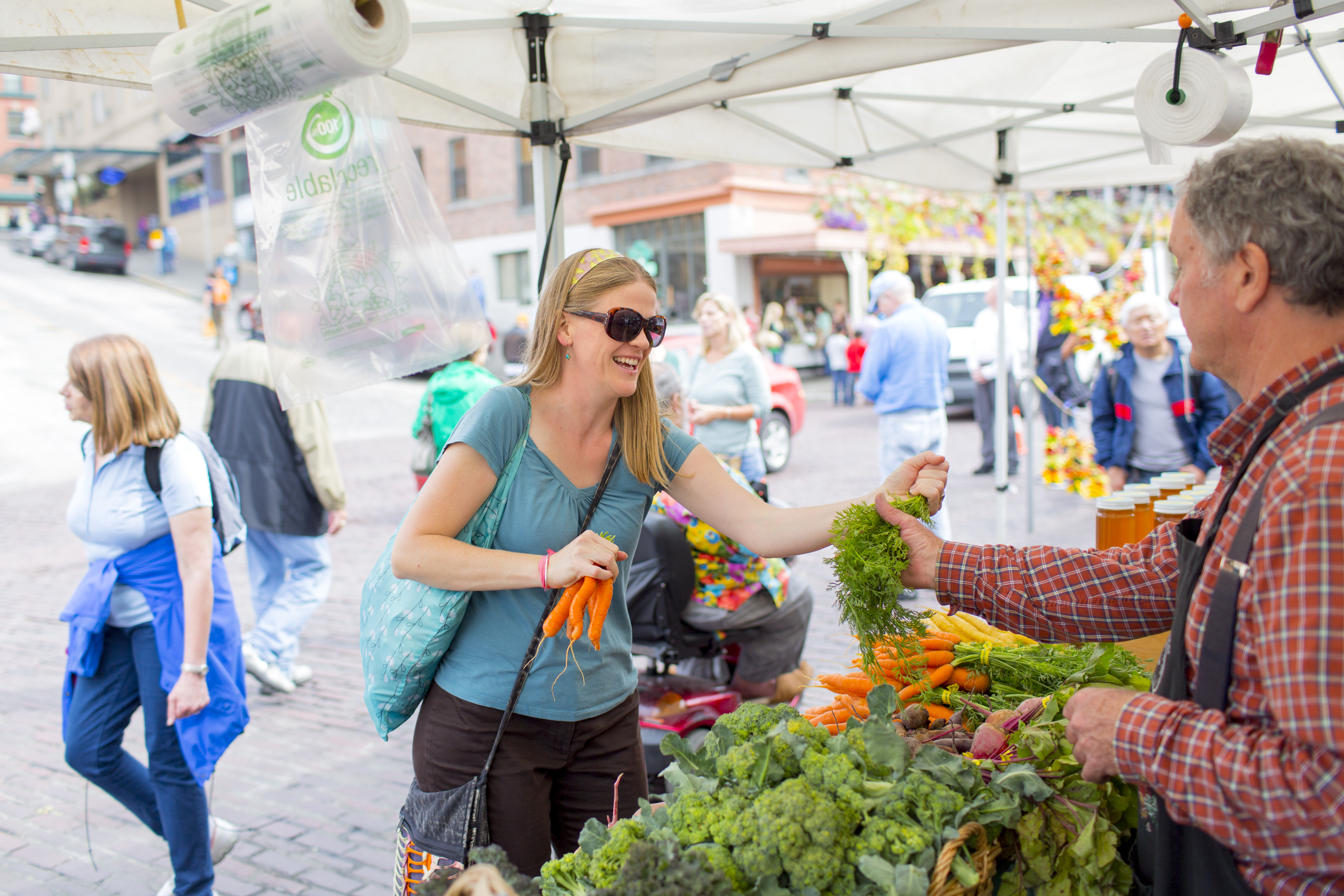 Pike Place farmers. Photo by Mike Kane Photography.
