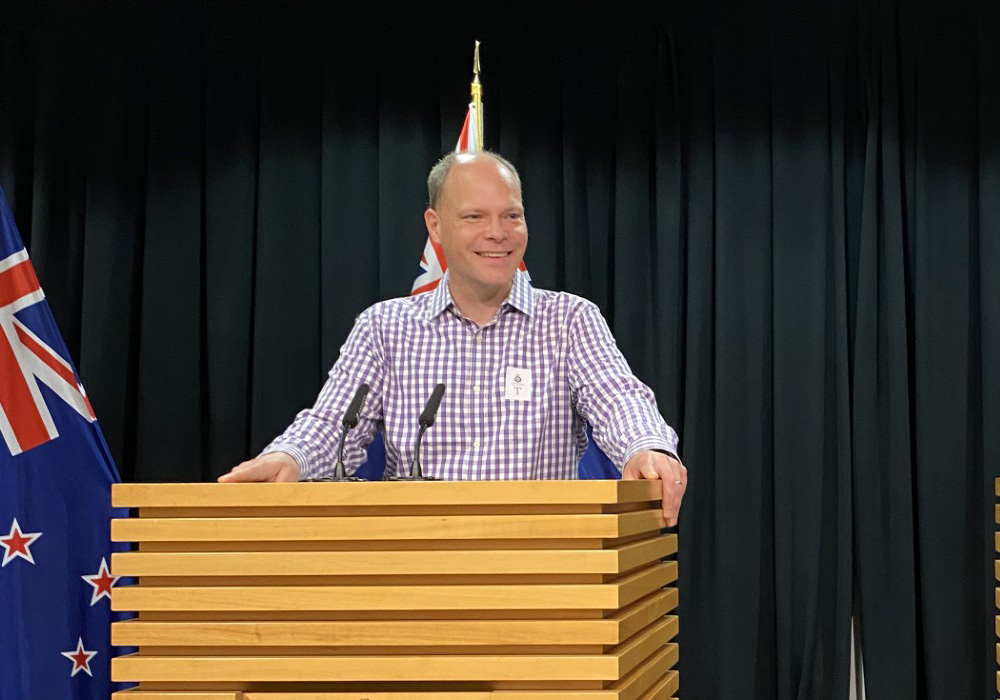Paul Holland, AICP, holds a mock press conference during a tour of the New Zealand Parliament Building, also known as the Beehive. Photo courtesy of Paul Holland.