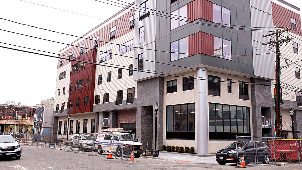 Residents will enjoy a view of the historic facade of St. Lucy’s Church directly across the street, where a new residential tower will include another 13 affordable units. Photo by Nadia Mian.