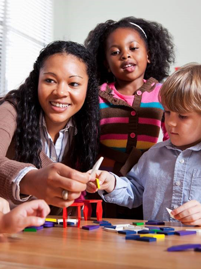 Teacher and early learning students.