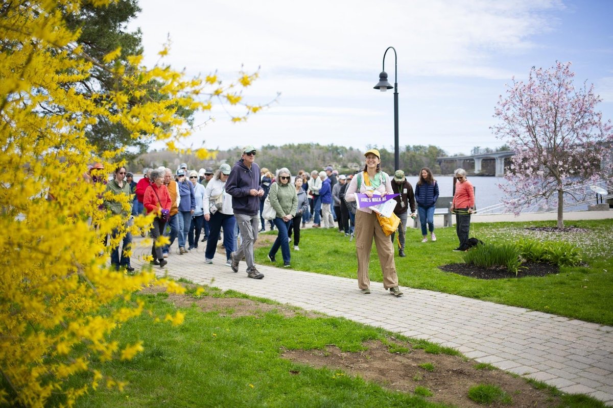 Group walks along the riverfront in downtown Bath. Photo by Joshua Langlais