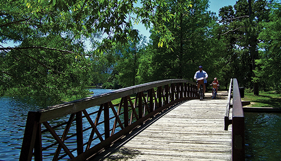 The lush greenery benefits from the fact that Hermann Park lies adjacent to Brays Bayou, an important waterway. Houston planners are working to use Hermann Park as an important piece of the Bayou Greenways Initiative to help mitigate the impact of flooding in the region