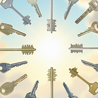 Assorted keys forming a circle against a bright sky background