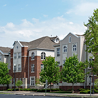 Row of Red Brick & Tan Apartments