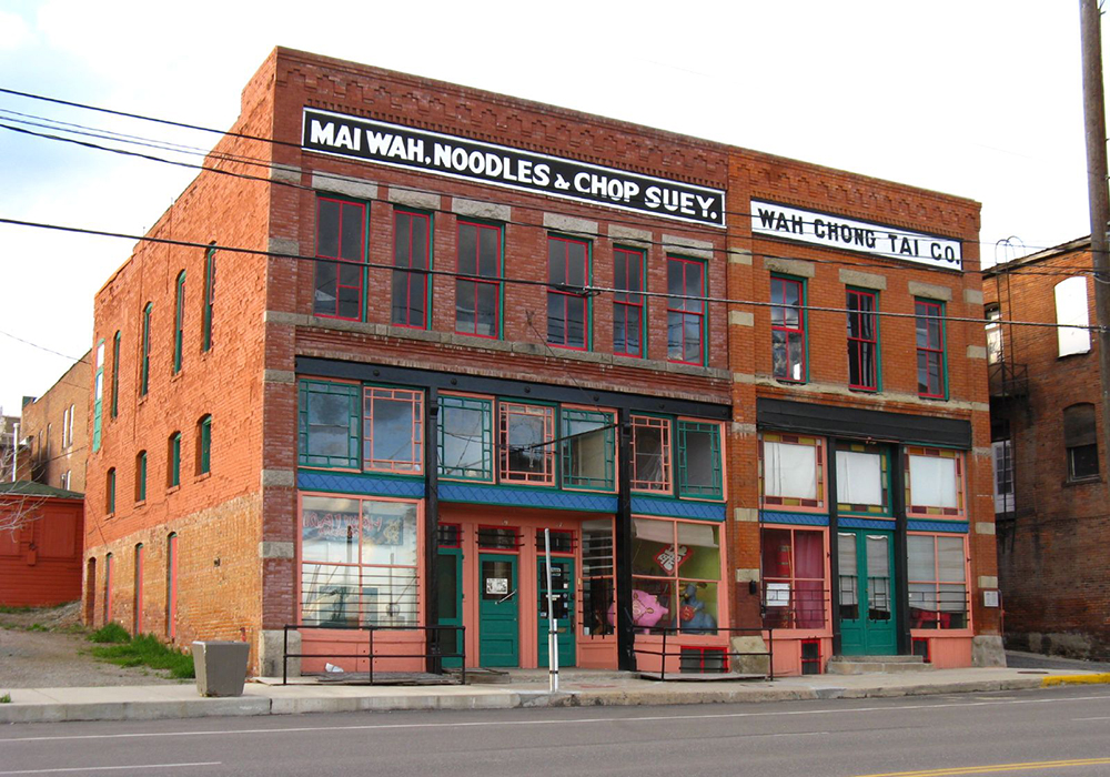 Mai Wah Noodle Parlor and Wah Chong Tai Mercantile. Credit: Flickr Jasperdo (CC BY-NC-ND 2.0)