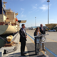 Ann Moore Port Chairwoman Ann Moore participates with Congressman Scott Peters and Port Vice Chairman Bob Nelson in a news conference in 2013 at one of the Port's maritime cargo terminals, illustrating Moore's collaboration with federal agencies.
