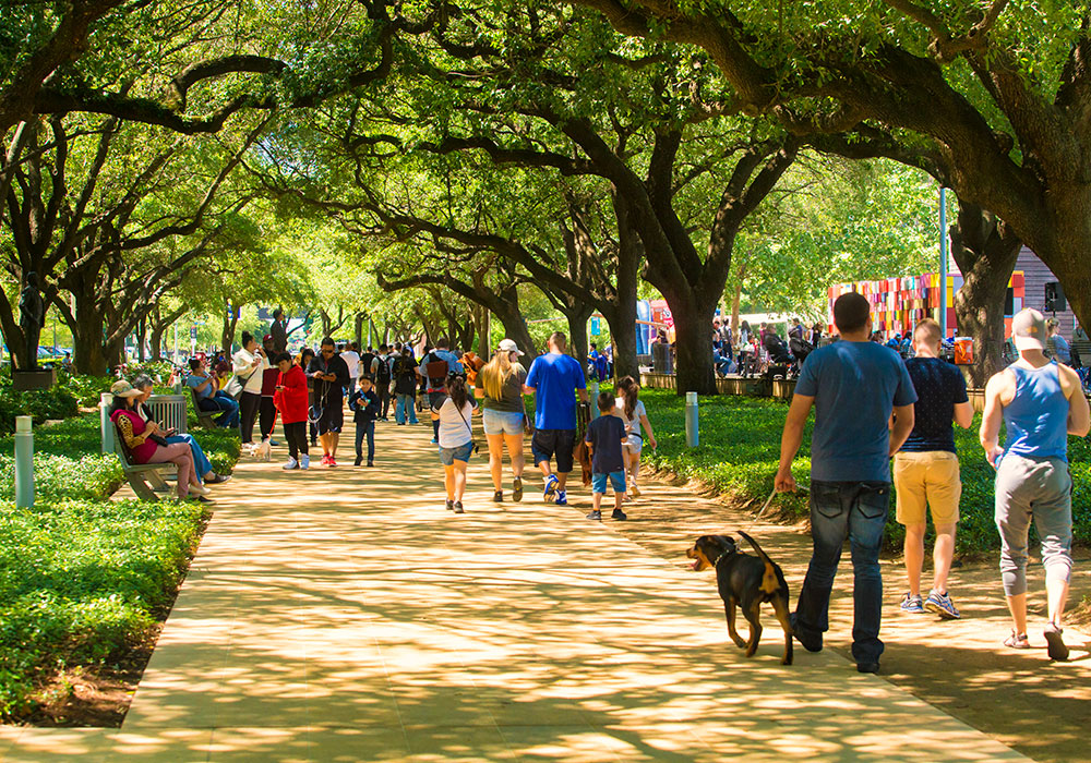 Park visitors on a multi-use path. Photo courtesy Discovery Green.