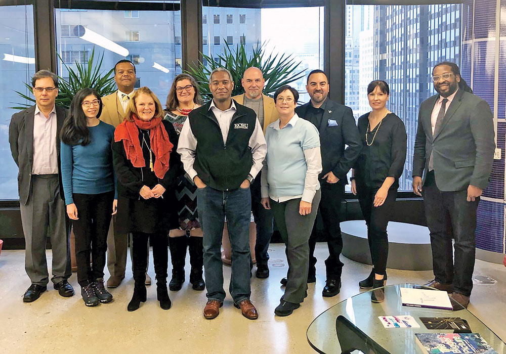 APA Social Equity Task Force members Victor Rubin; Marcella Bondie Keenan; Kirk Harris; Susan Wood, AICP; Jess Zimbabwe; Carlton Eley, AICP; Wes Grooms; Cynthia Bowen, FAICP; Jonathan Bell; Kadie Bell Sata, AICP; and Majestic Lane gathered at APA Chicago in January. Photo by Michael Johnson.