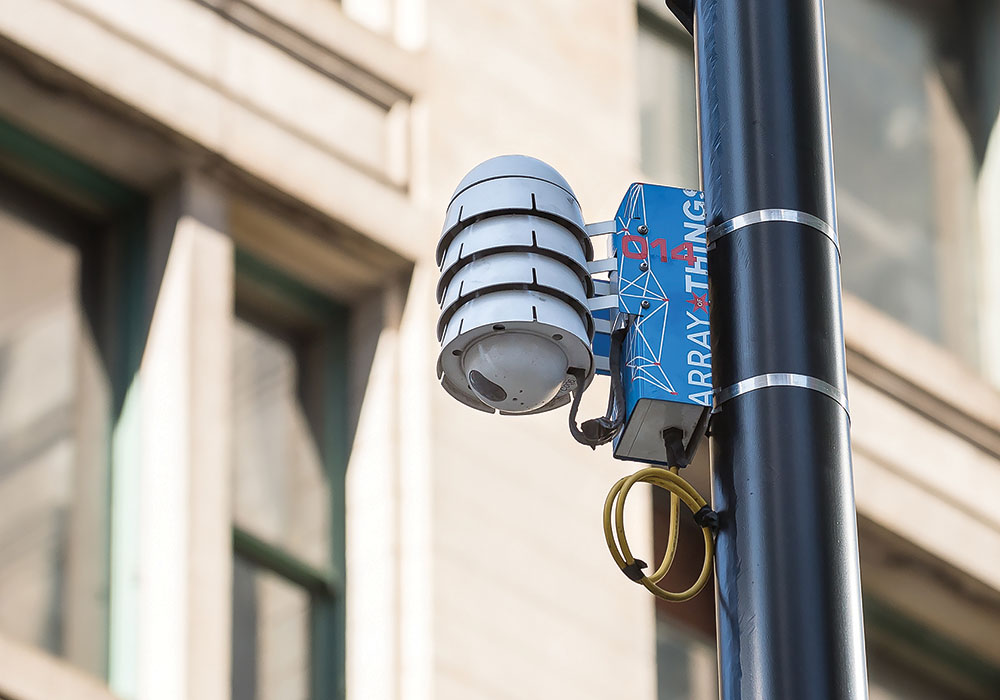 In Chicago, Array of Things nodes are attached to 200 utility poles. Data from the network of sensors, including weather instruments, pollution measurement equipment, cameras, and microphones, is available to researchers and businesses. Photo courtesy Argonne National Laboratory.