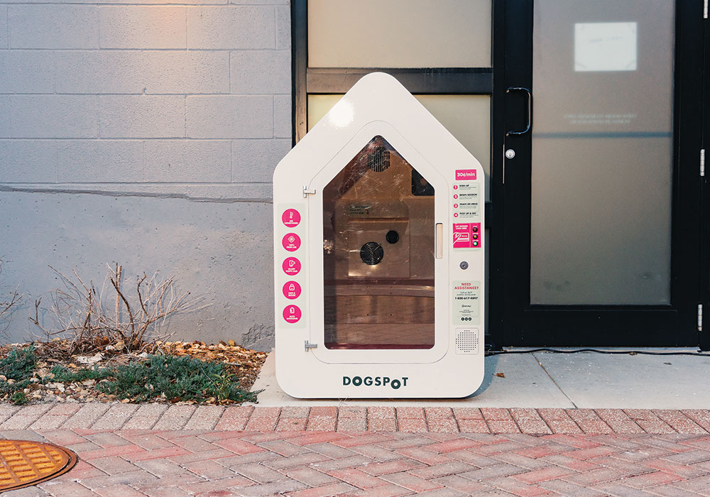 In Kansas City, dog houses designed by Dogspot, a tech startup, are outfitted with cameras and temperature controls. People can leave pets in the secure kennels while they run quick errands. Photo by Barrette Emke for The New York Times.