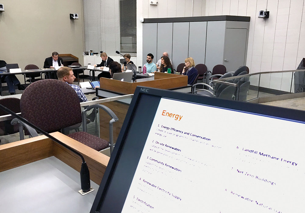 The steering committee works on the plan (Anne Russett is seated at the far right.) Photo courtesy Iowa City.