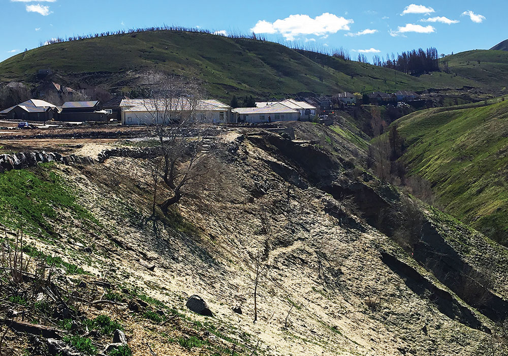 Following the 2015 Sleepy Hollow Fire in Wenatchee, Washington, affected residents of the Broadview neighborhood were required to increase setbacks from the slope to maintain adequate defensible space and reduce risk from slope instability. Photo by Molly Mowery.