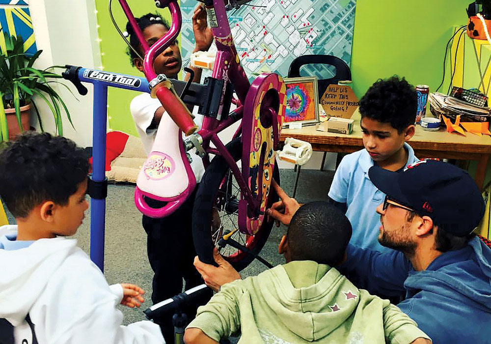 RAD, Springfield’s Mobile Community Bike Shop, hosts a popular DIY bike workshop on Monday afternoons. It’s one of several classes and workshops hosted by community organizations at Make-It Springfield. Photo by Michael Di Pasquale.