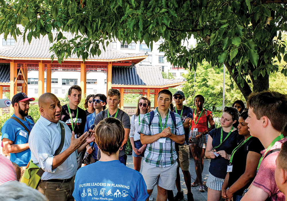 Ernie Wong of Site Design Group and 2019 FLIP participants discuss urban design elements of Ping Tom Park in Chicago’s Chinatown neighborhood. Photo courtesy CMAP staff.