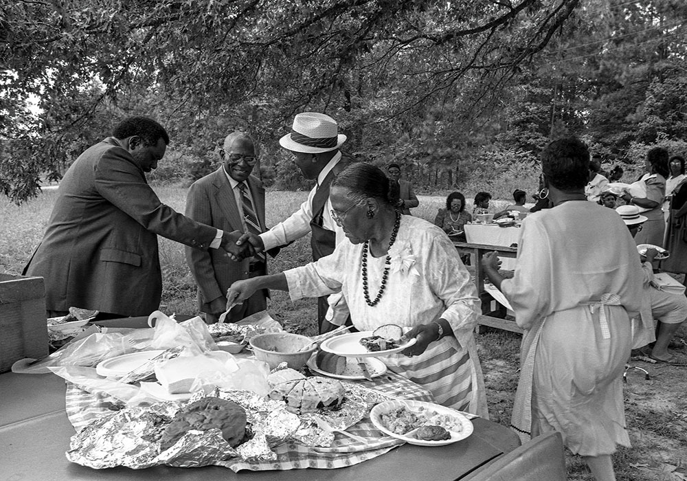 A local church hosts a picnic during County Line’s 1991 homecoming. The three-day event, which still takes place today, honors the Texas freedom colony’s history and residents — past, present, and future. Photo by Richard Orton.