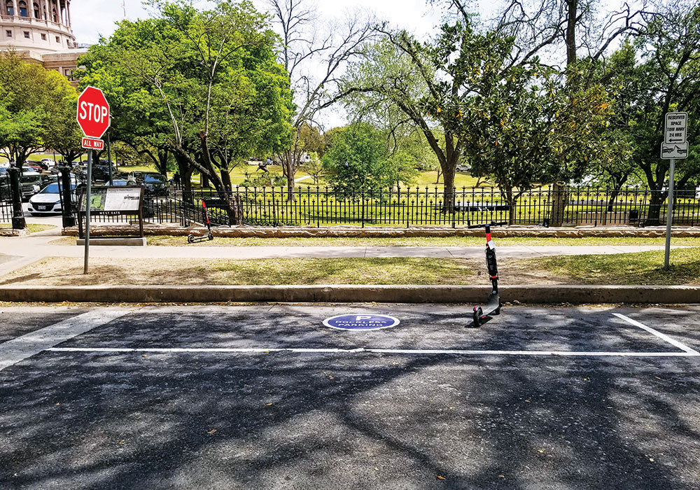 Austin, Texas, repurposed an on-street parking area to serve as a designated dockless scooter parking space, a concept that sometimes has had mixed success. Photo courtesy Austin Transportation Department.