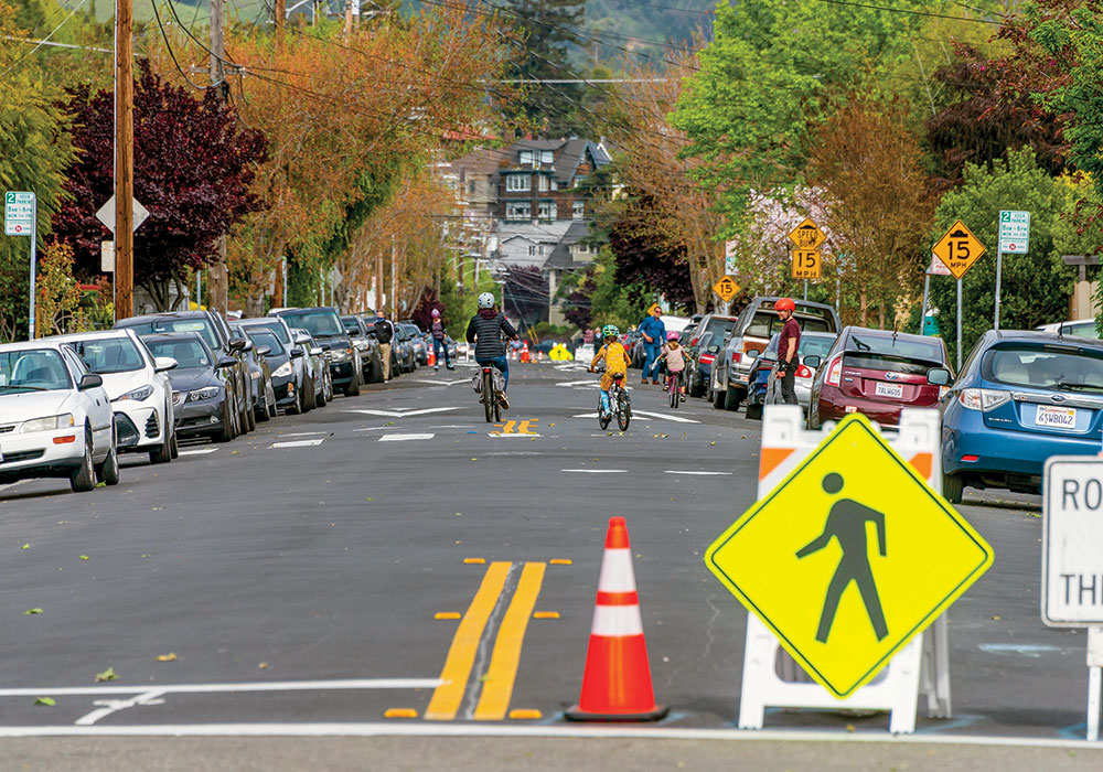 Oakland’s Slow Streets program launched during the pandemic, opening up 16 miles (and counting) to bicyclists and pedestrians. Photo by Sergio Ruiz.